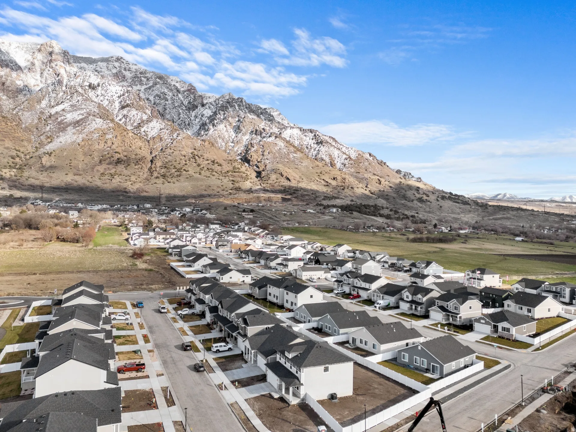 Aerial view of residential area with a mountain backdrop