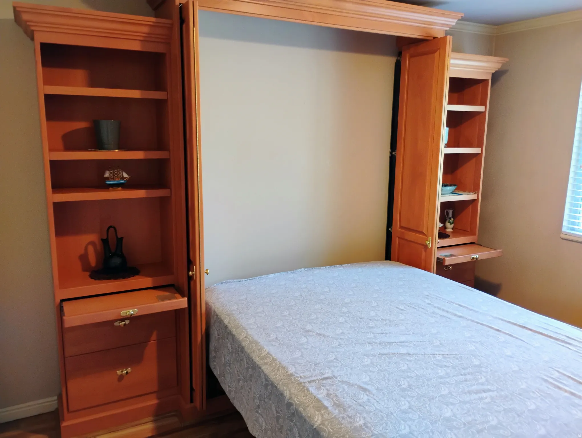 Bedroom featuring dark wood-style flooring