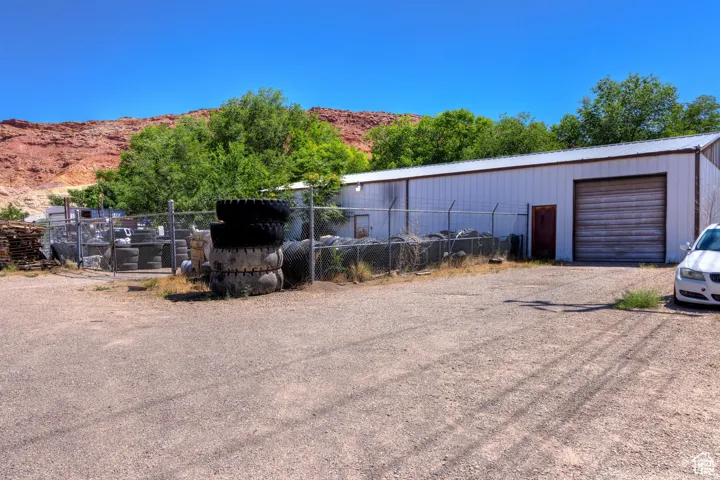 Exterior space with a mountain view and driveway