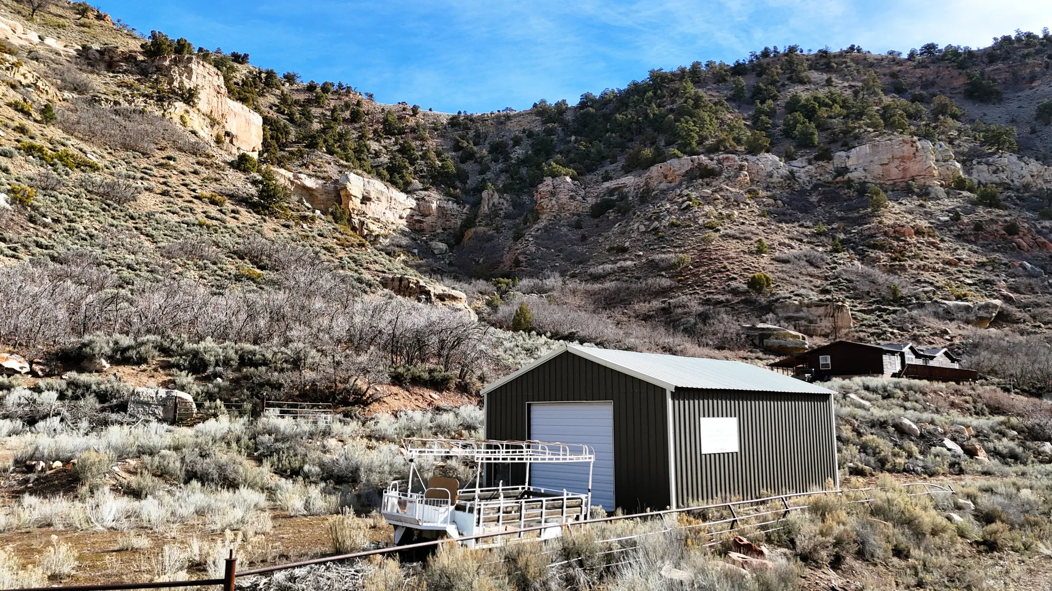 View of outbuilding featuring a mountain view