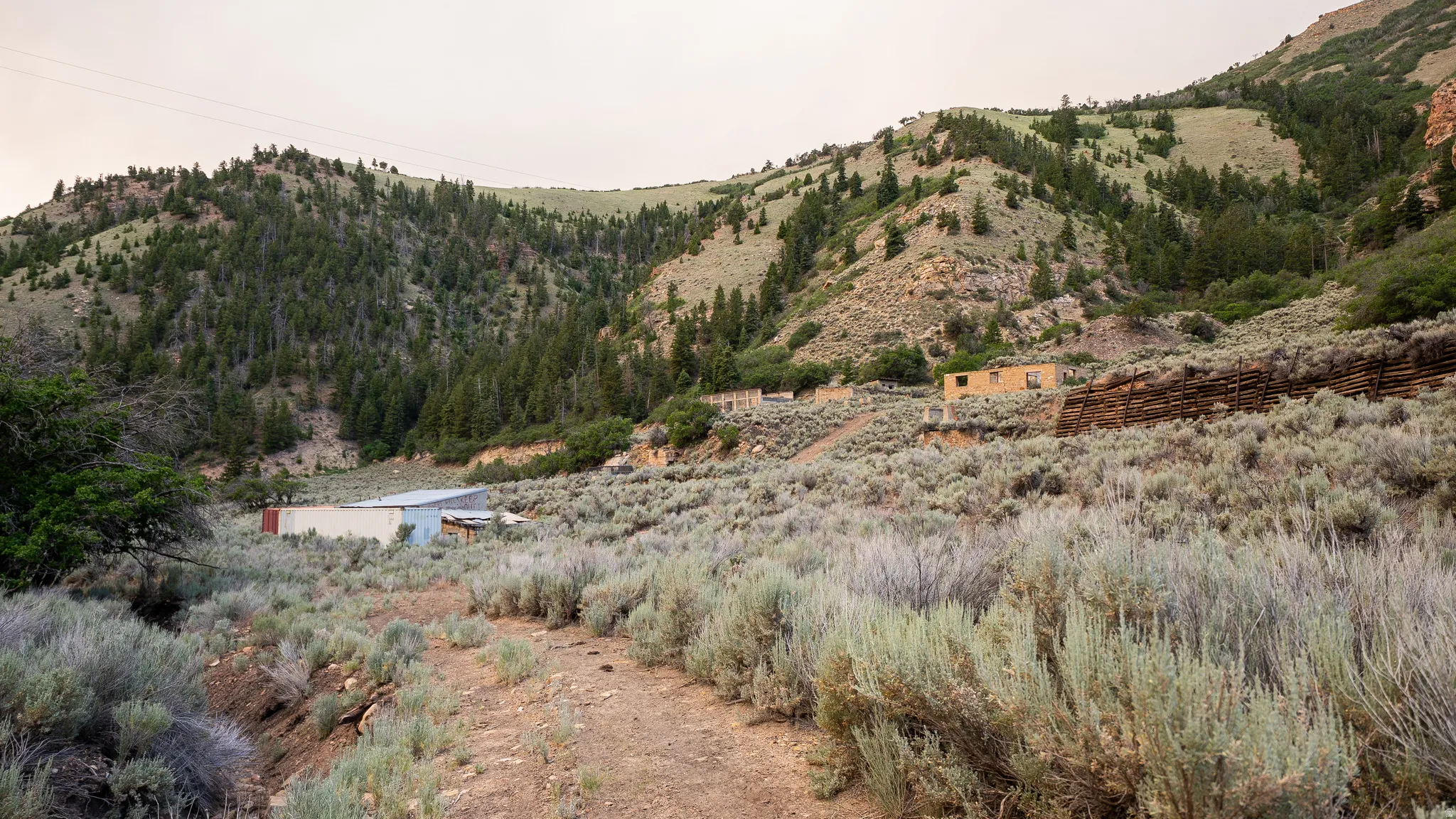 Expansive mountain landscape featuring rugged terrain and diverse vegetation
