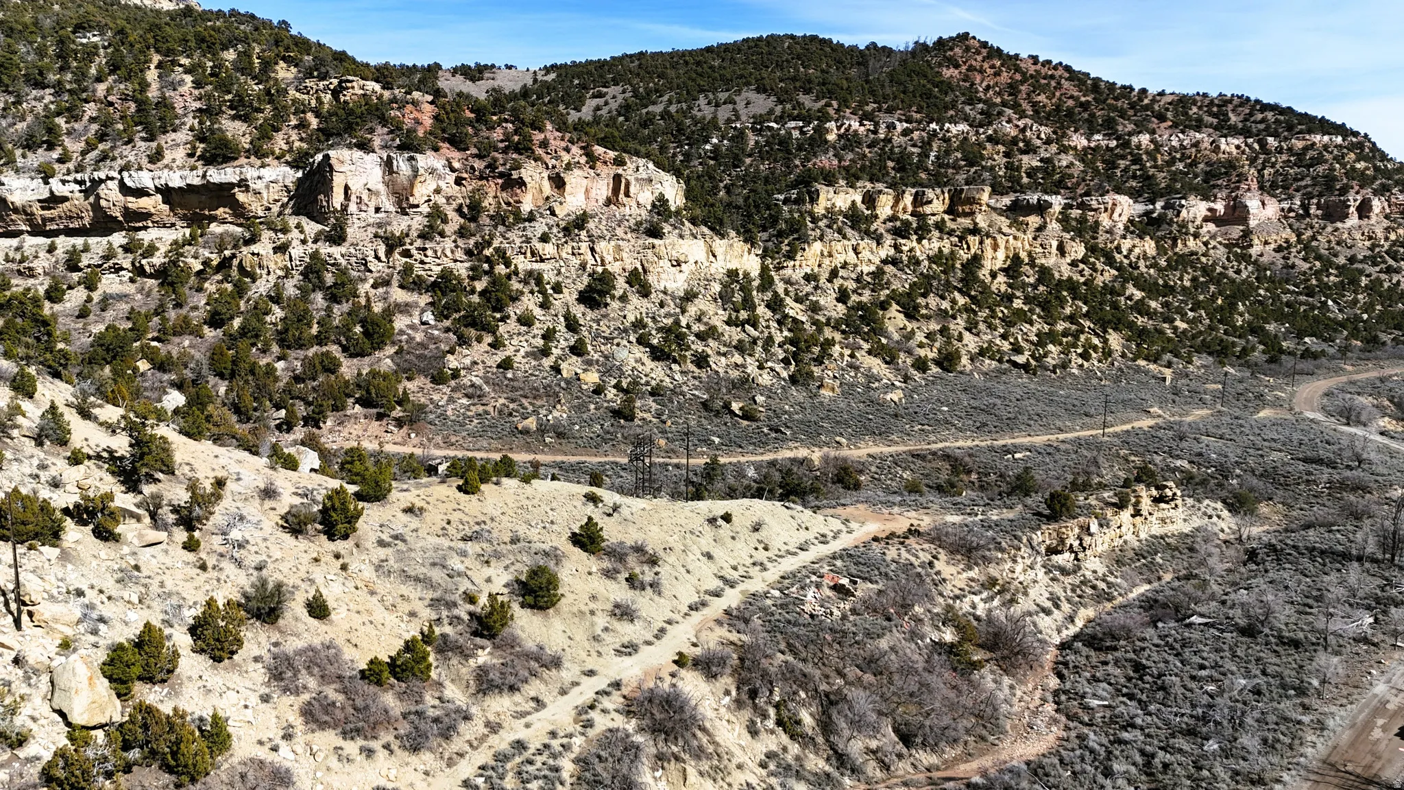 View of mountain backdrop featuring a desert landscape and rural landscape