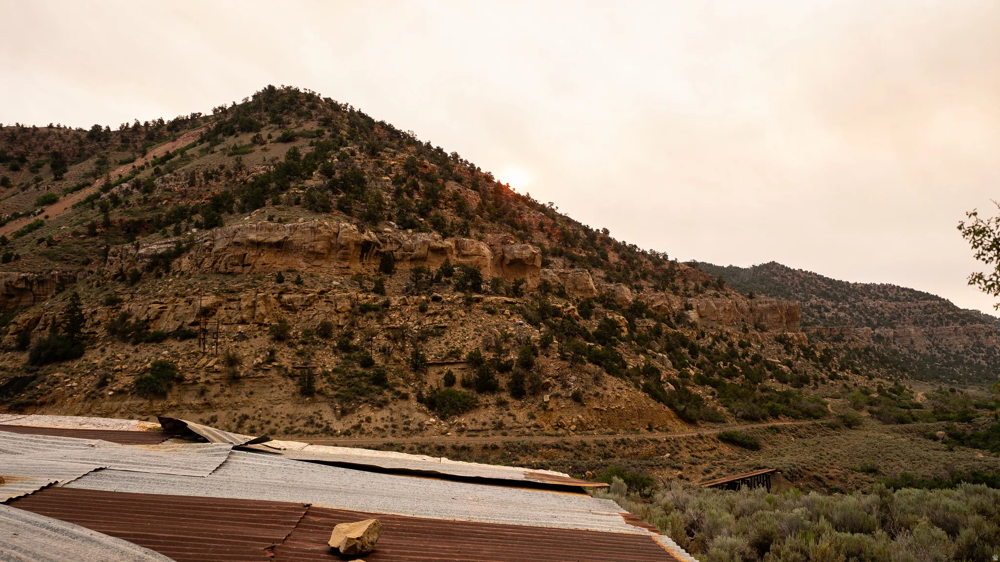 Mountainous terrain featuring natural rock formations and abundant low-lying vegetation