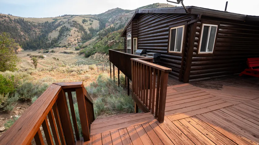 Expansive wood-finish deck with integrated stairs