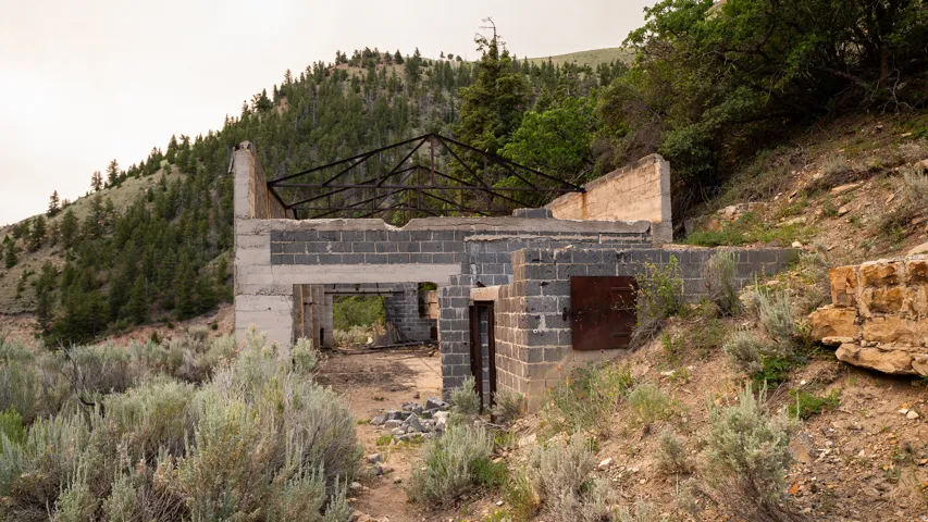 Concrete block structure with exposed rebar roof framing