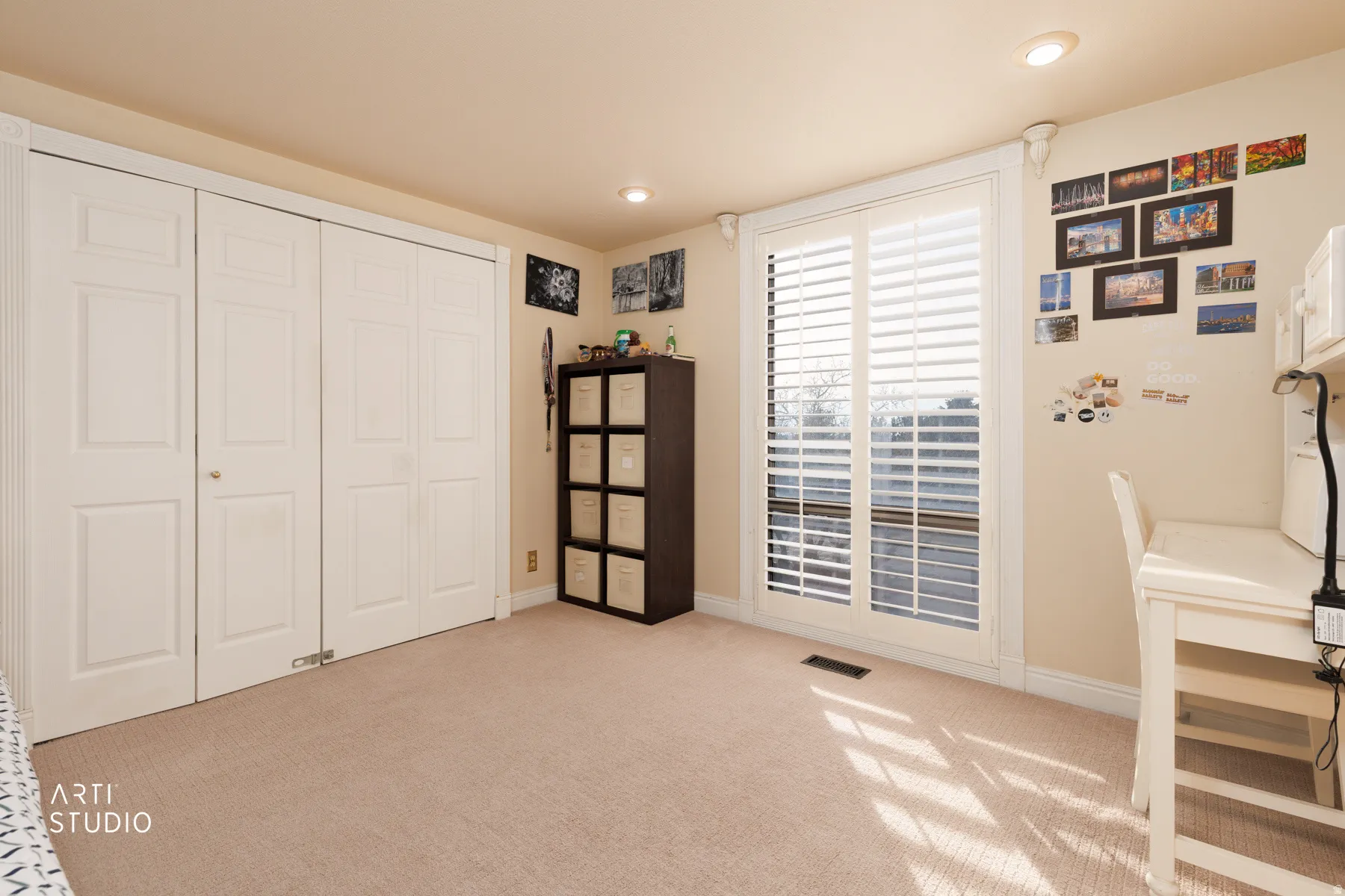 Office space featuring light carpet and recessed lighting