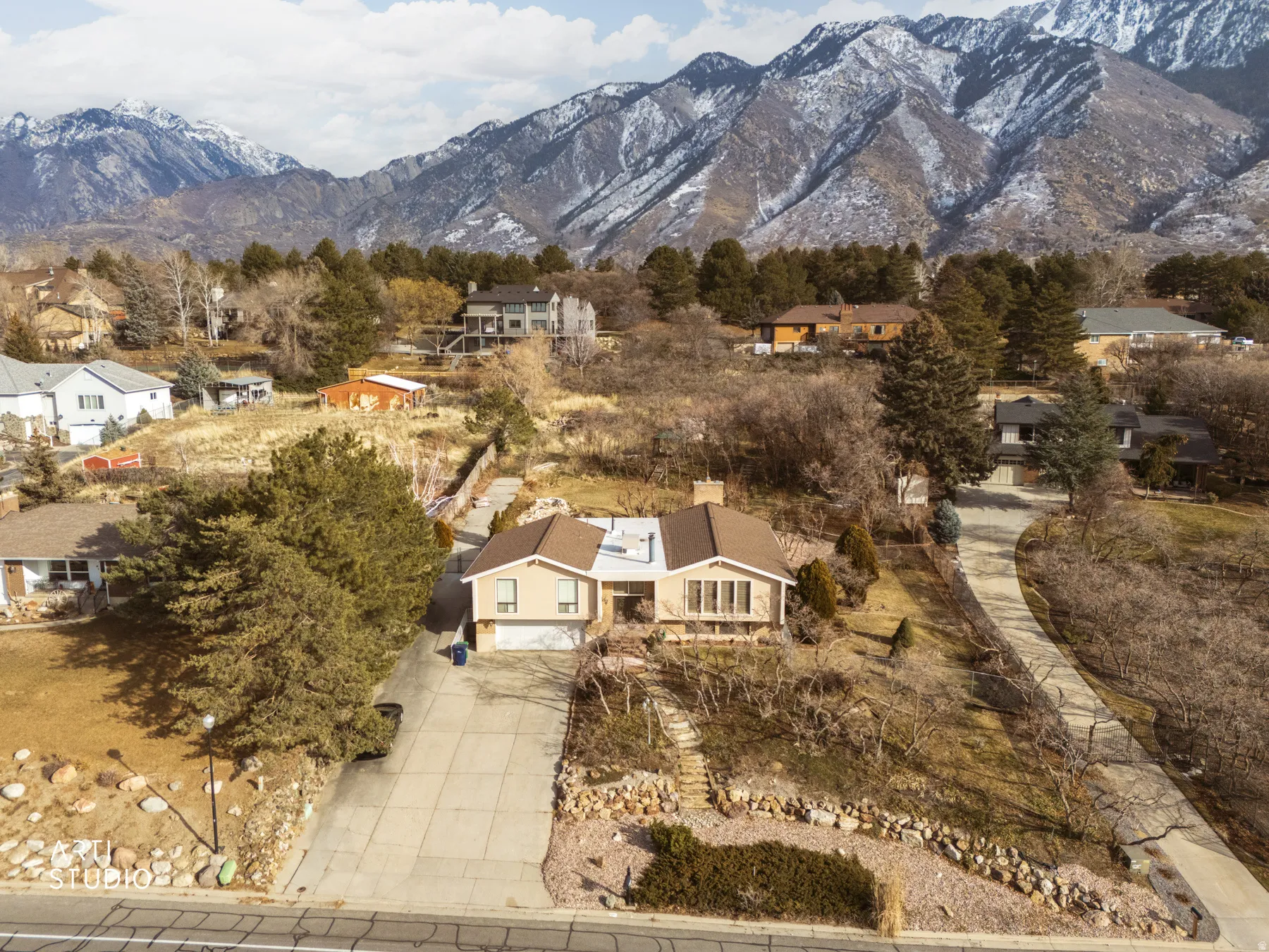 Aerial view of residential area with mountains