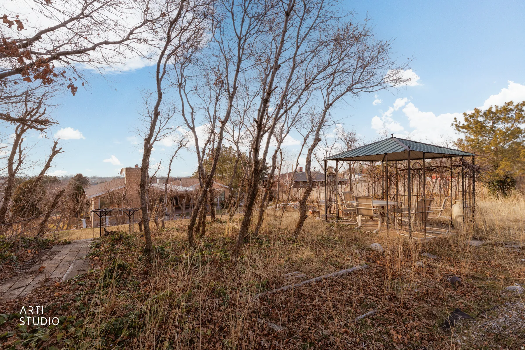 View of yard featuring a gazebo and a patio