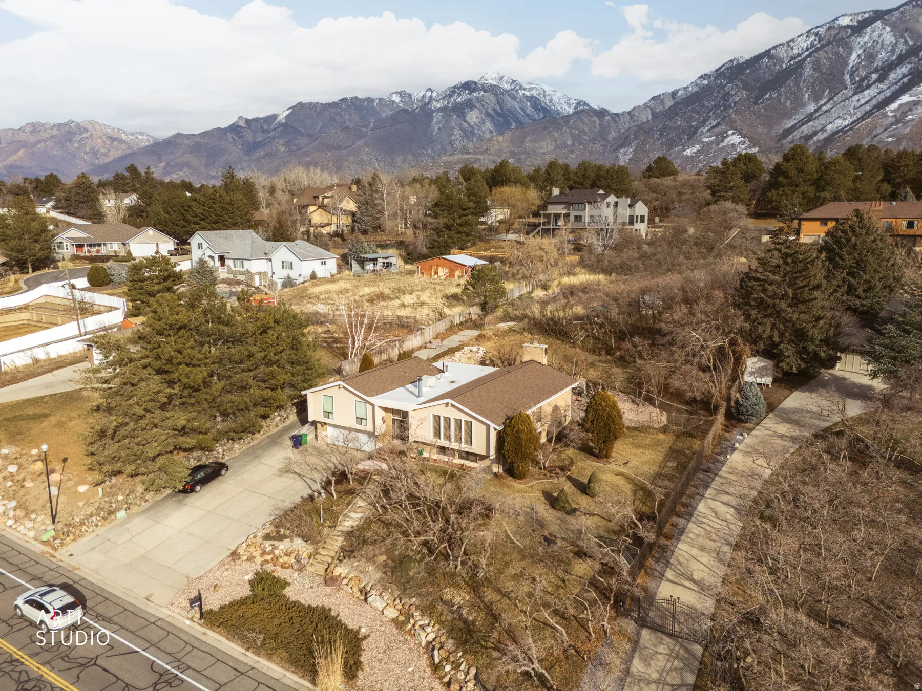 Aerial view of residential area with a mountain backdrop