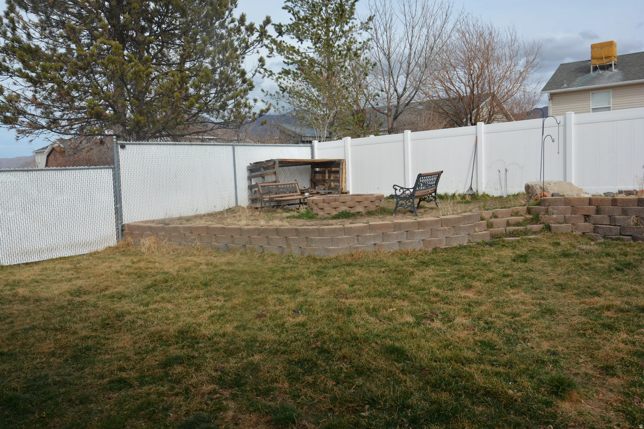 Fenced backyard featuring a patio area
