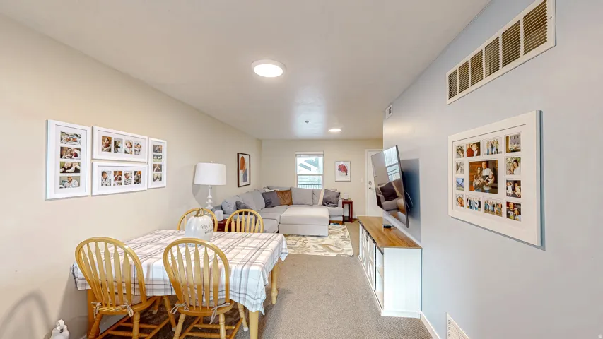 View of carpeted dining space