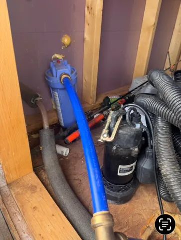 water line coming into pump house from well
