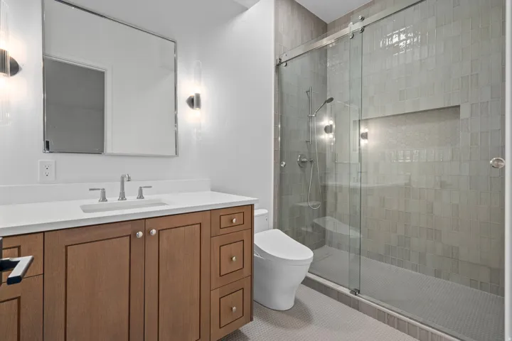 ADU Bathroom featuring vanity and a shower stall