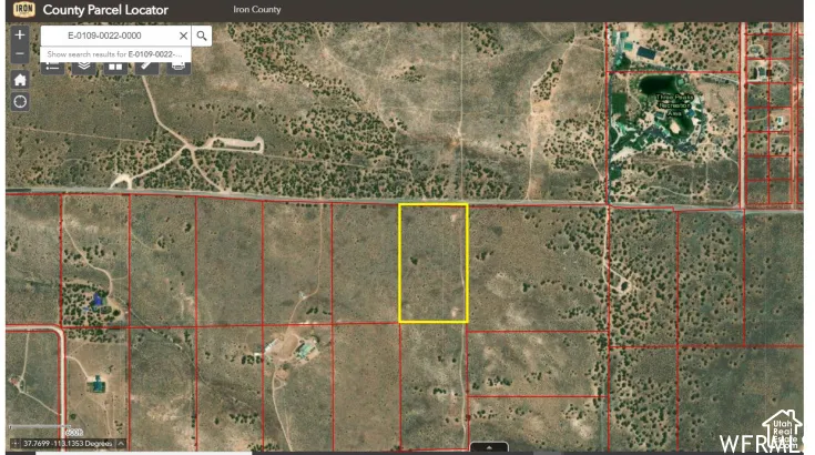 Aerial map of property and surrounding area featuring property parcel outlined