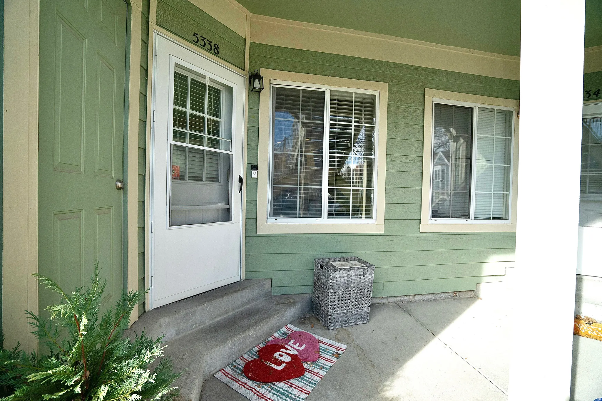 Property entrance featuring covered porch