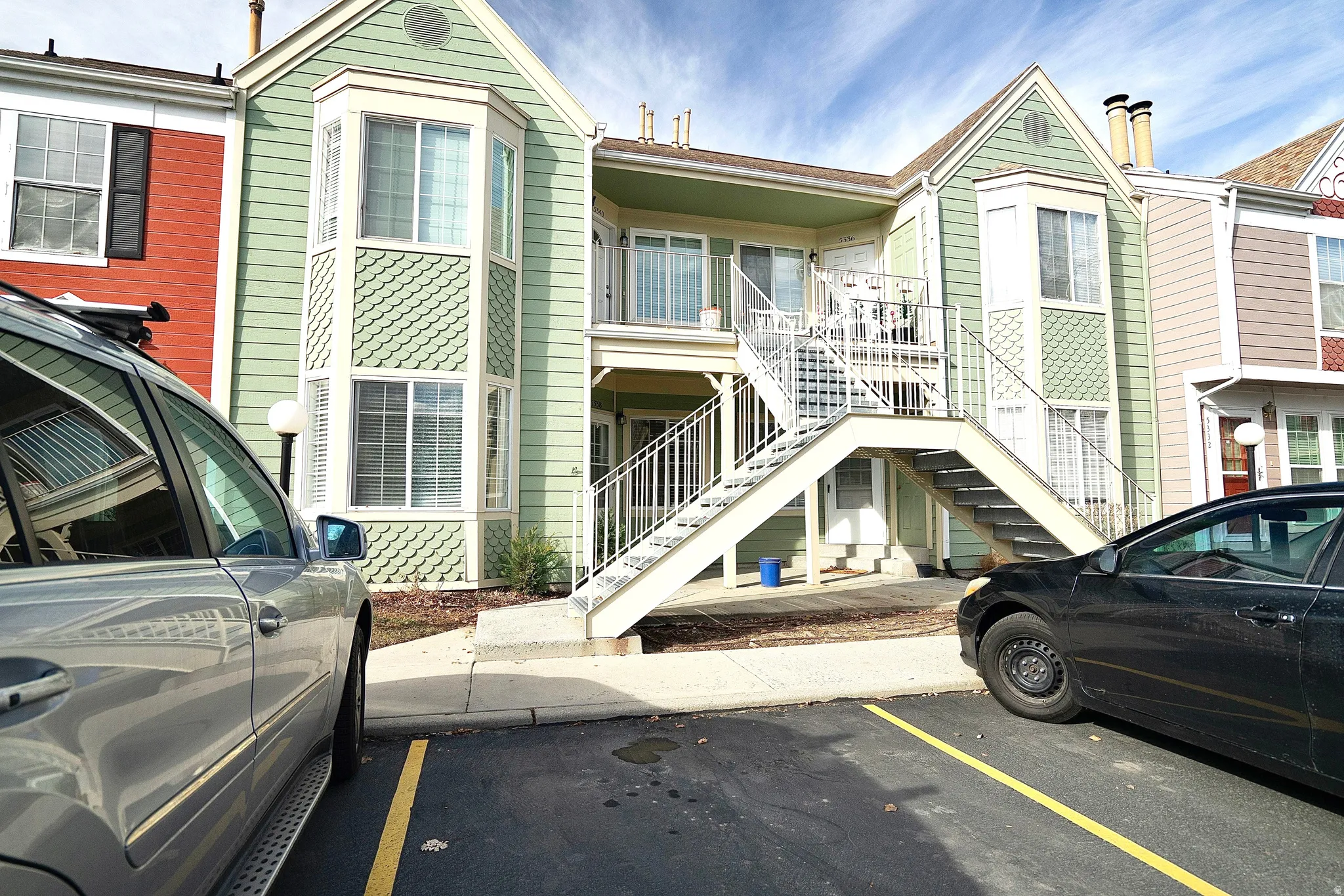 View of front facade with uncovered parking