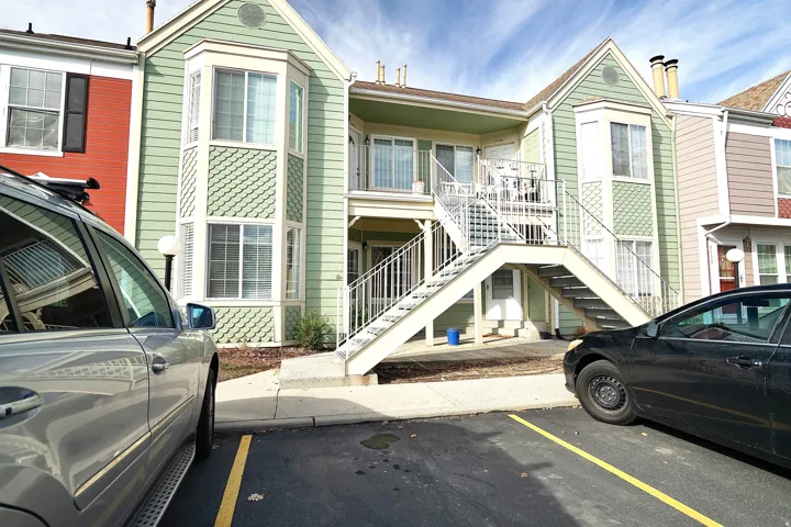 View of front facade with uncovered parking