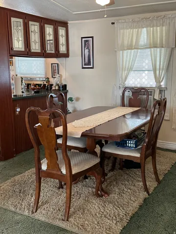 Dining space with ceiling fan