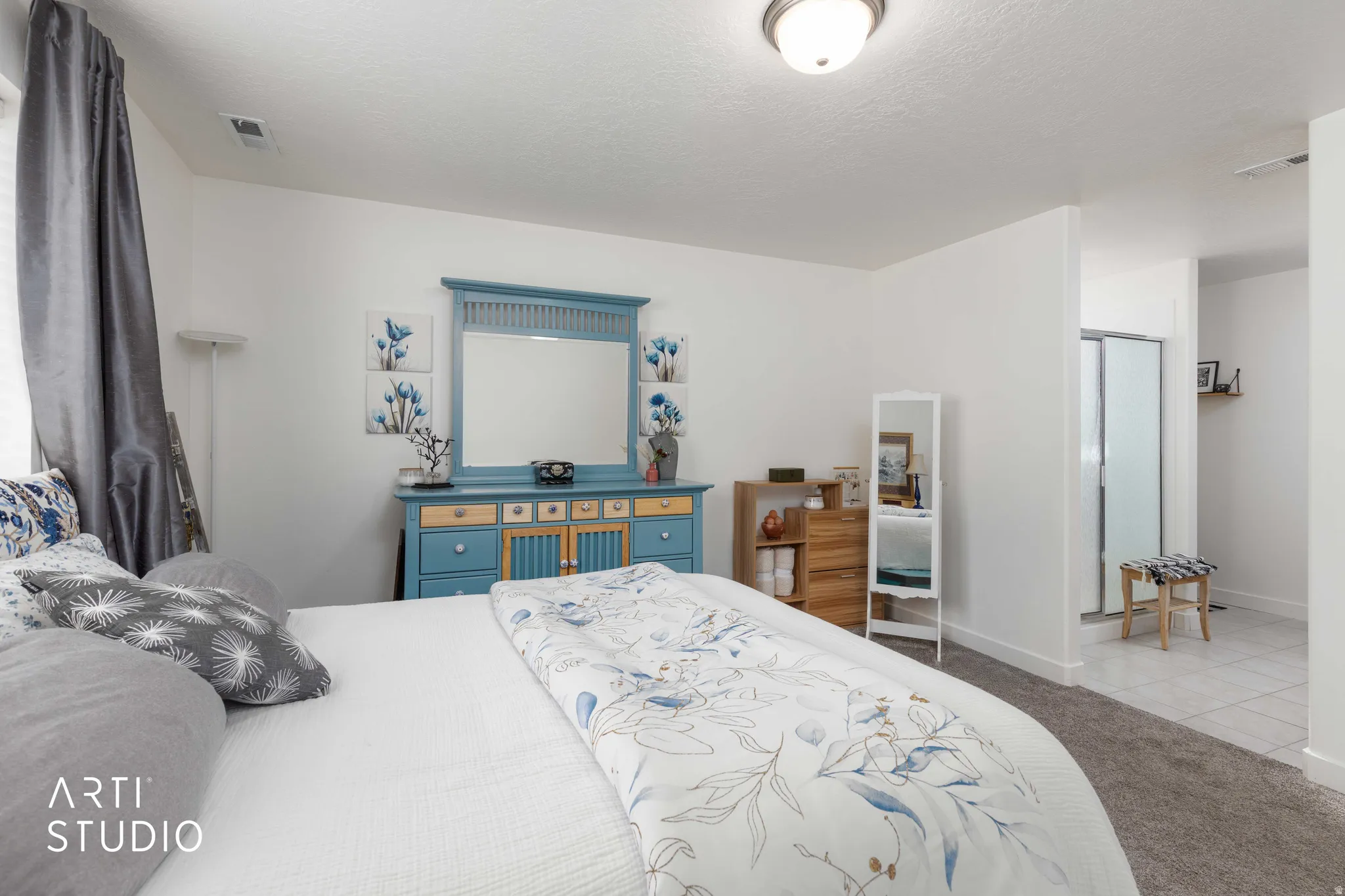 Bedroom with carpet flooring and baseboards