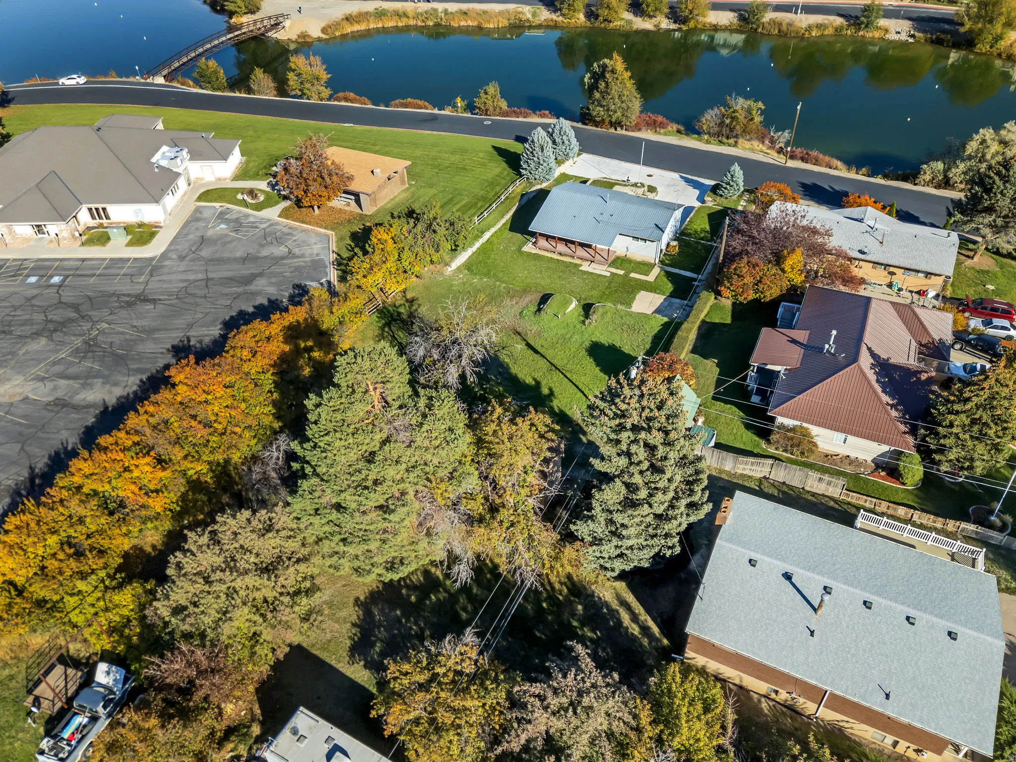 Aerial perspective of suburban area with a large body of water