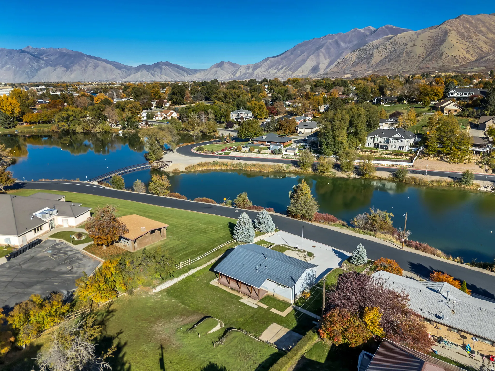 Aerial view of residential area with a water and mountain view