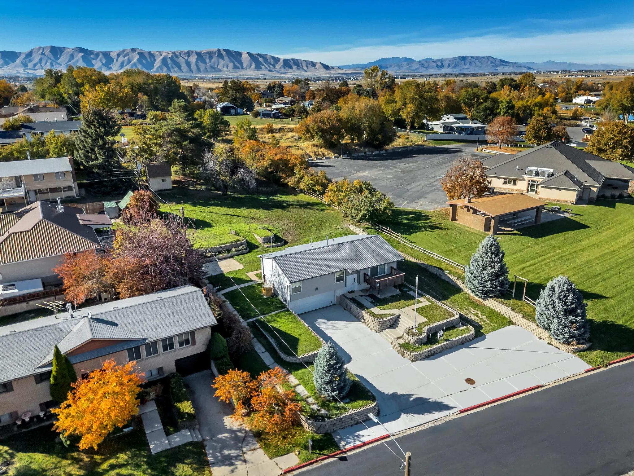 Aerial perspective of suburban area featuring mountains