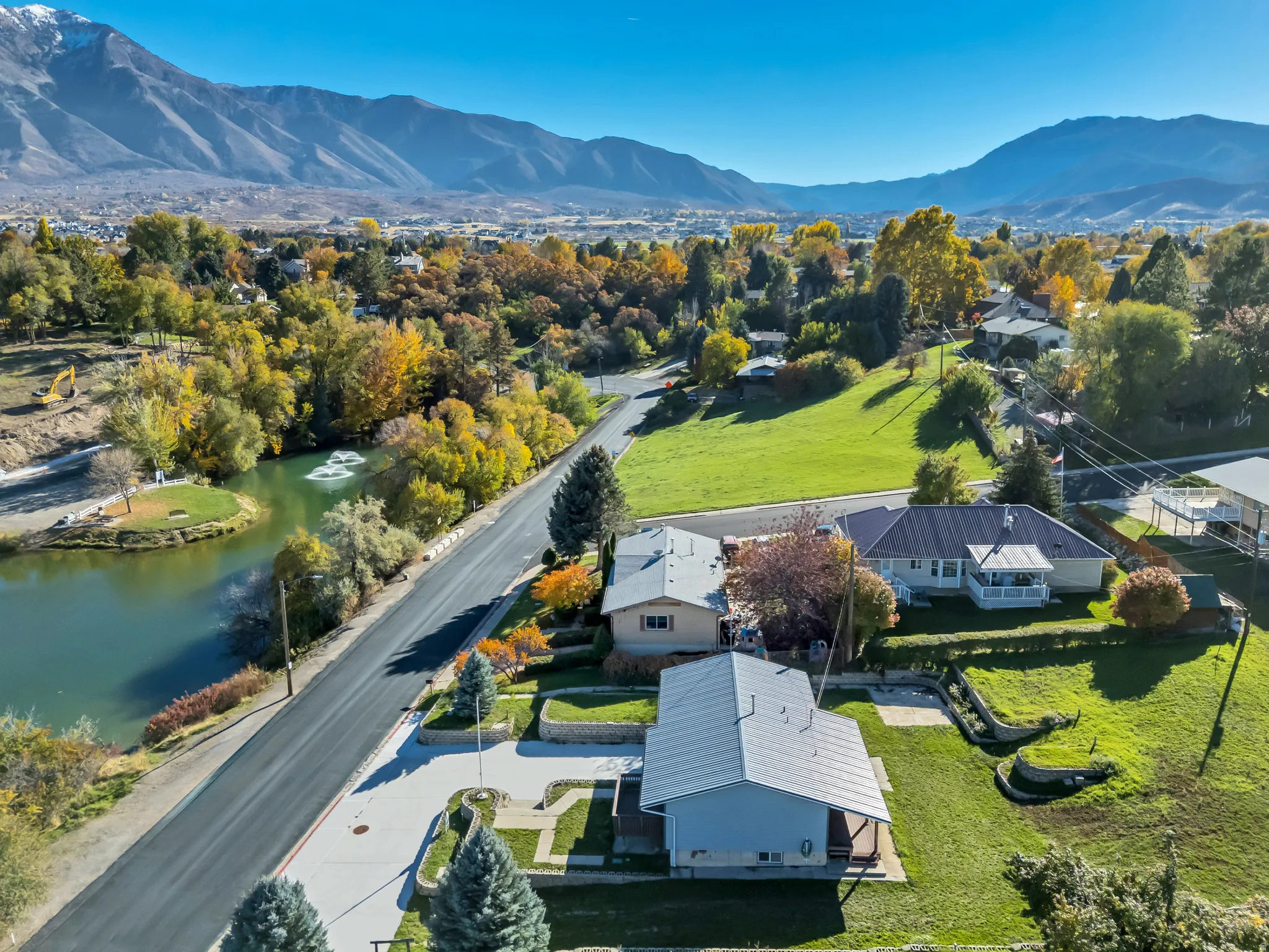 Aerial view of residential area with a water and mountain view