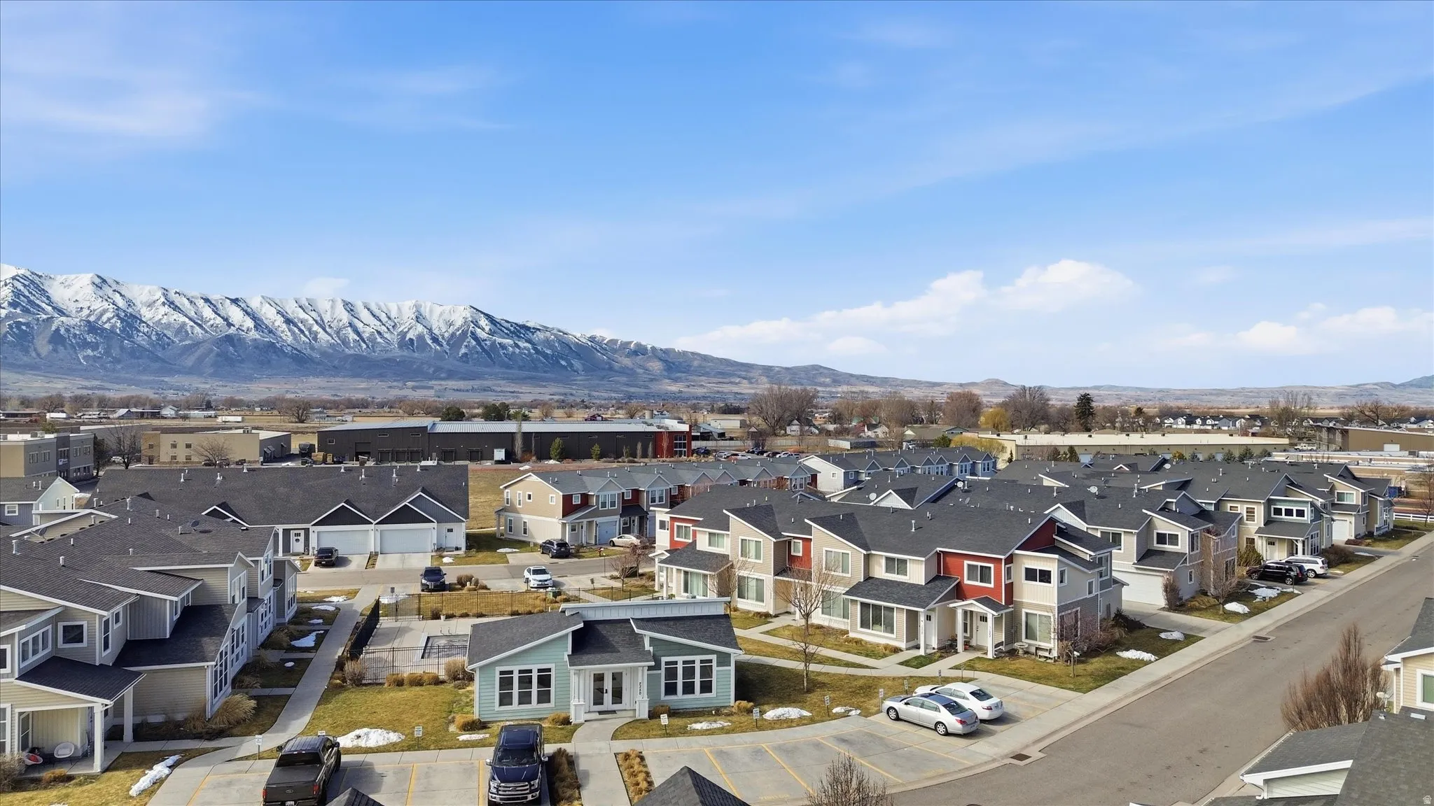 Aerial view of residential area with mountains