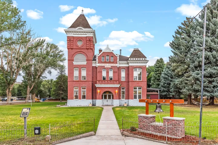 View of property with a fenced front yard