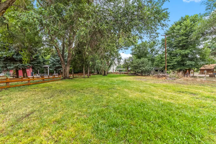 View of yard featuring view of wooded area
