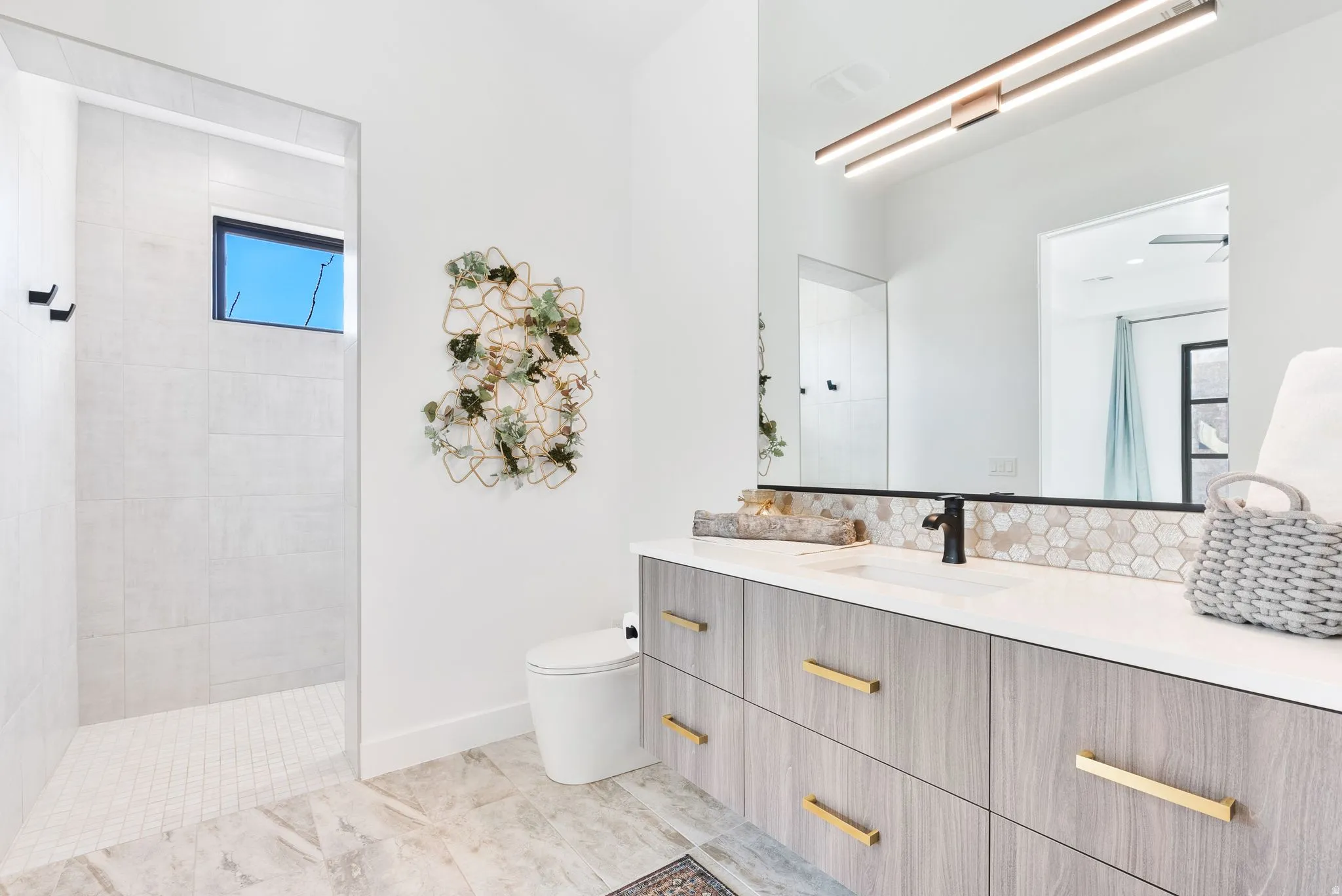 Full bathroom with vanity and a walk in shower