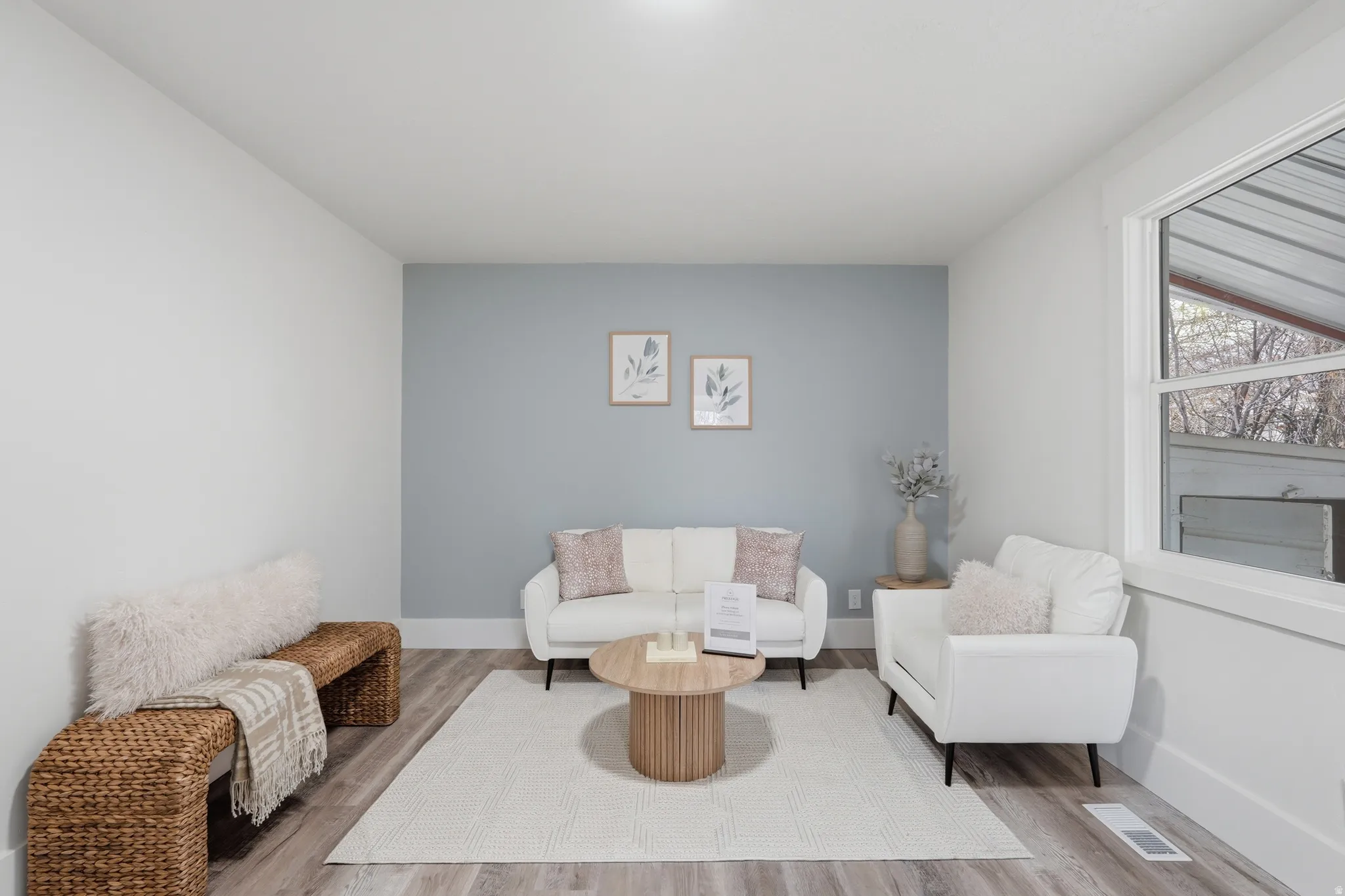 Living area featuring wood finished floors