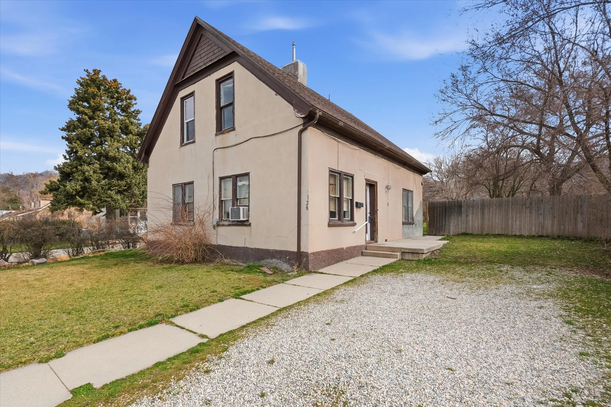 View of property exterior with stucco siding