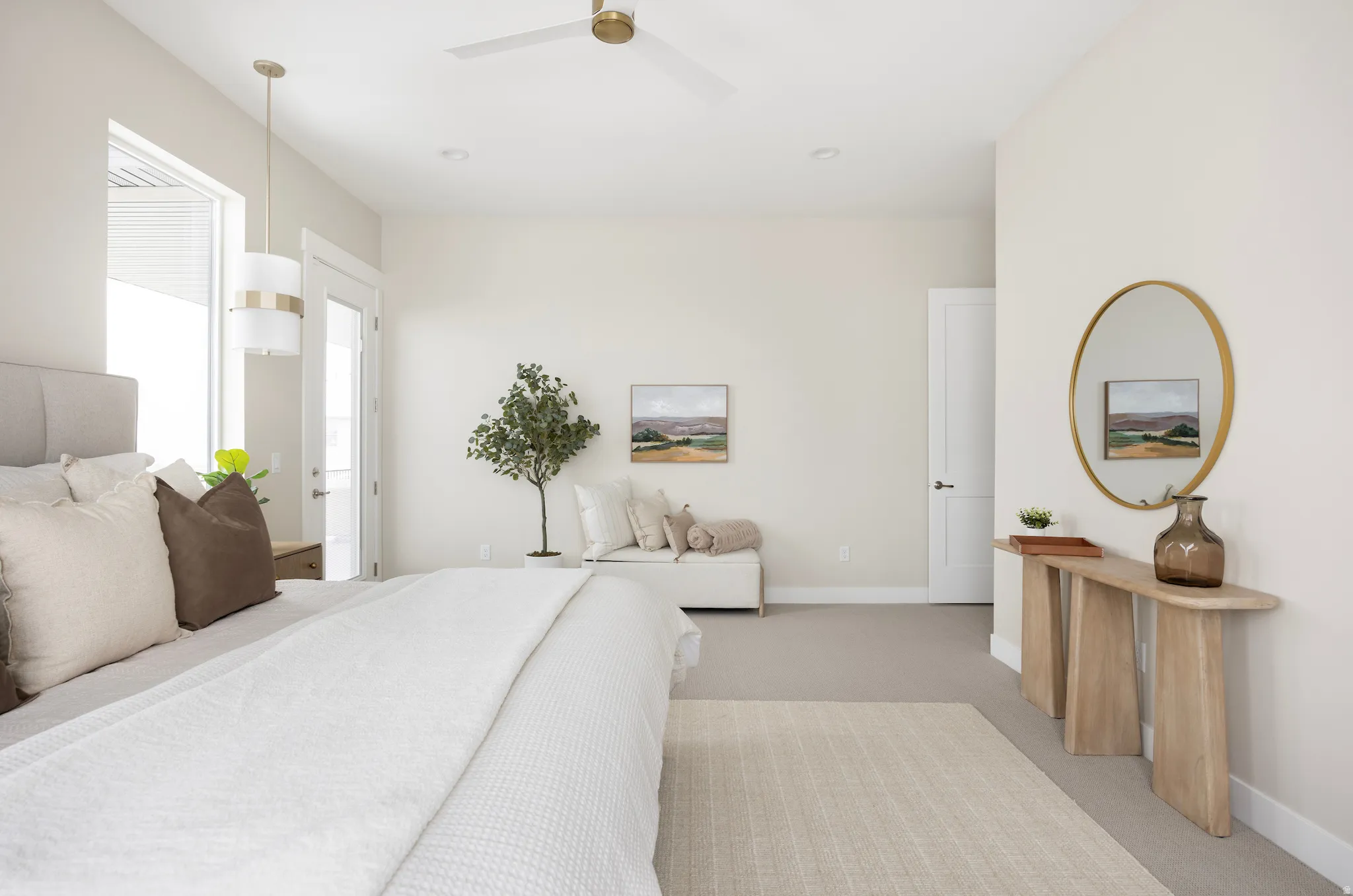Bedroom with light carpet, ceiling fan, and recessed lighting