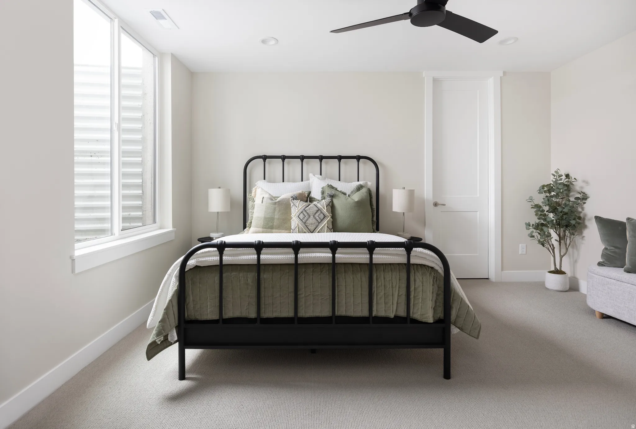 Bedroom featuring carpet floors, ceiling fan, and recessed lighting