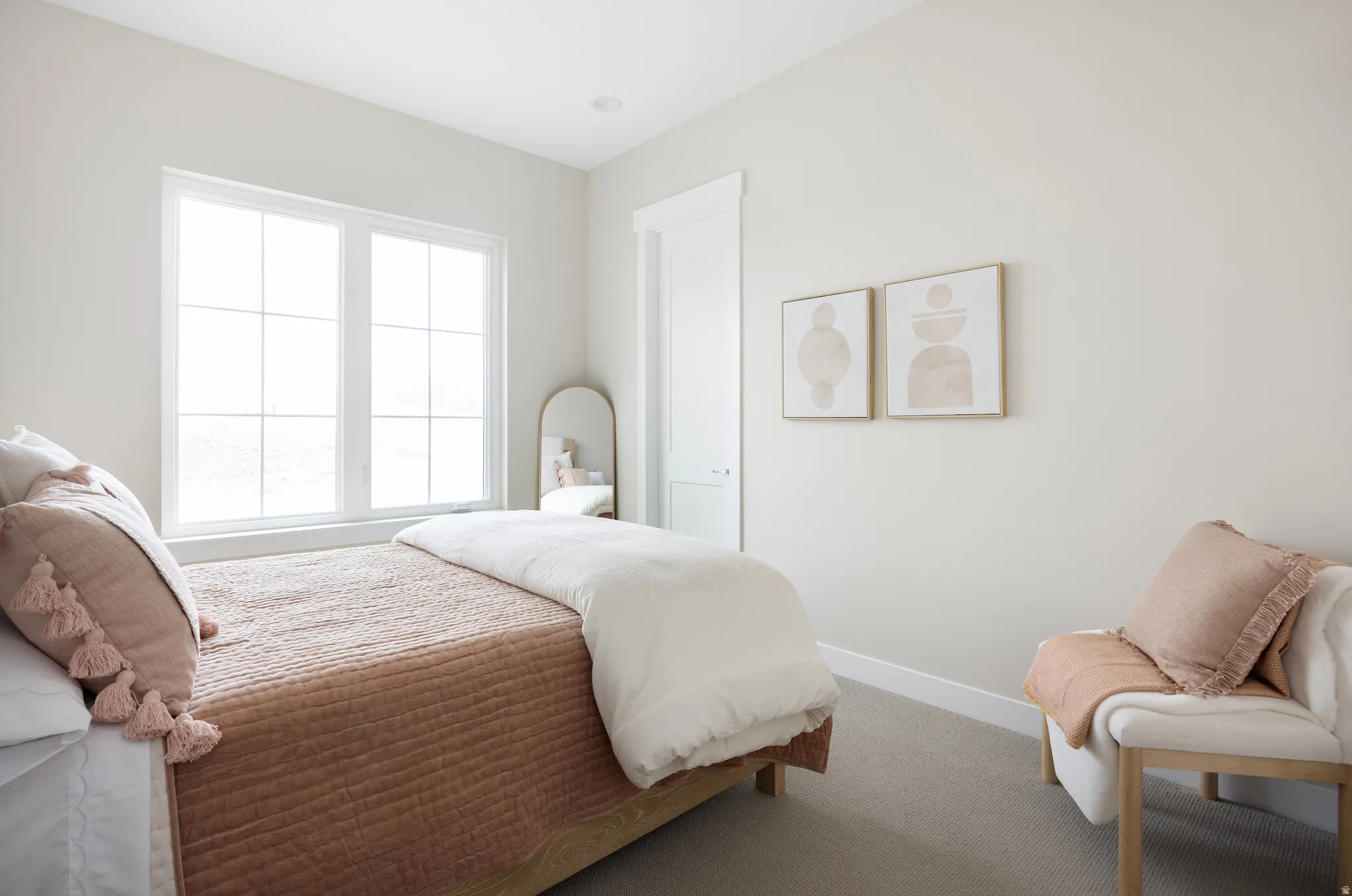 Bedroom with baseboards and carpet flooring