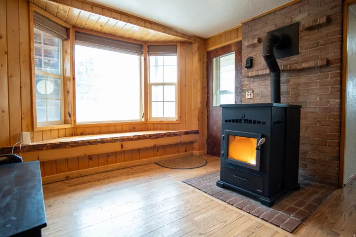 Family Room wood stove and bay window