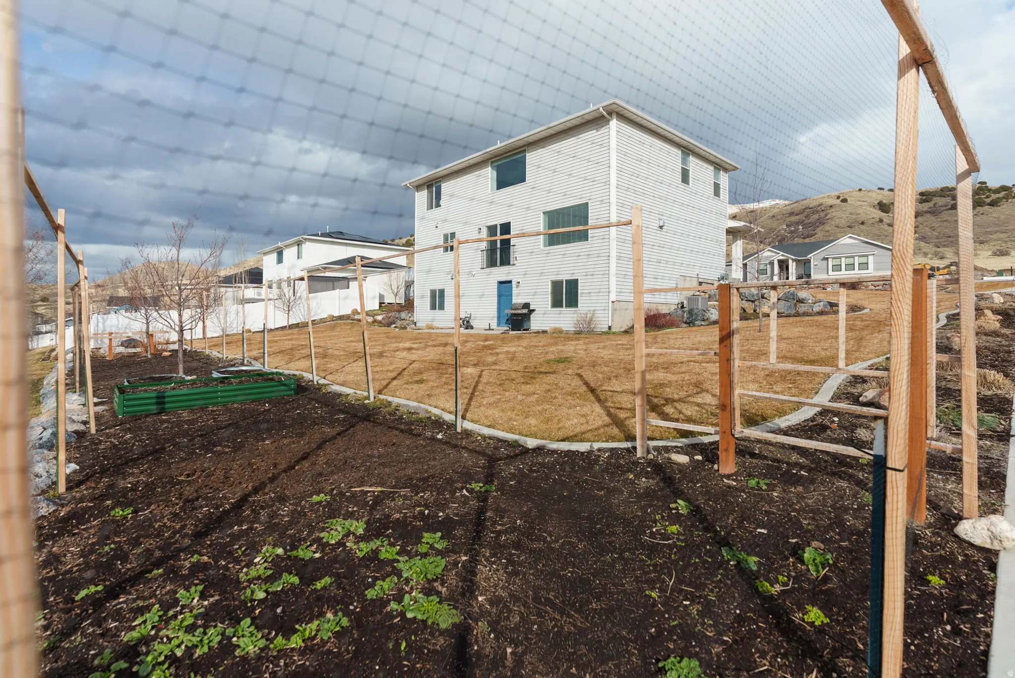 View of yard featuring a vegetable garden