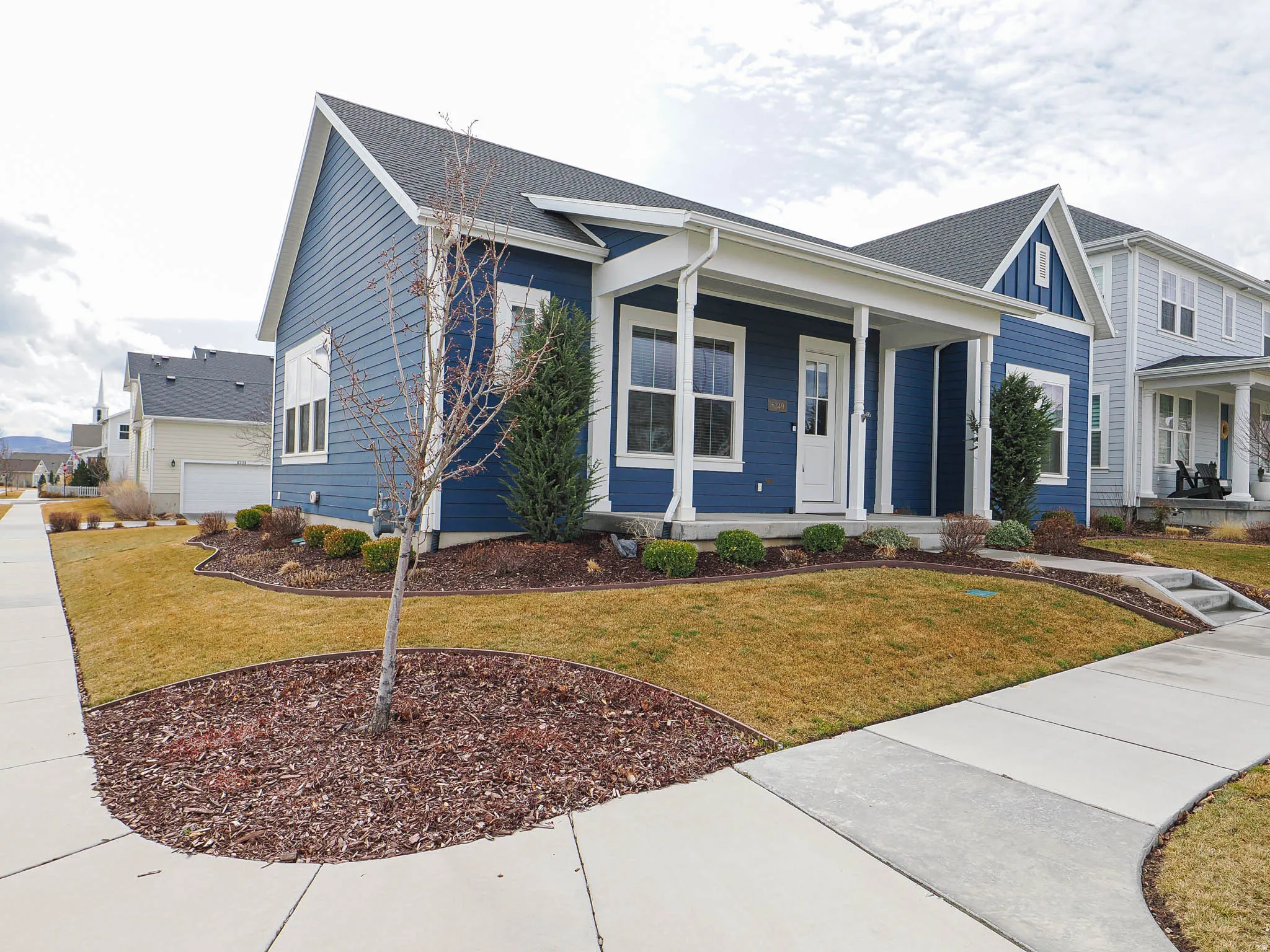 Corner lot with full landscaping. Area may be fenced for small children or pets.