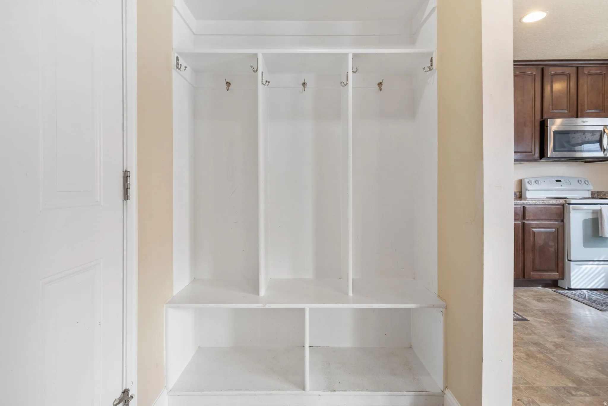 Mudroom with recessed lighting