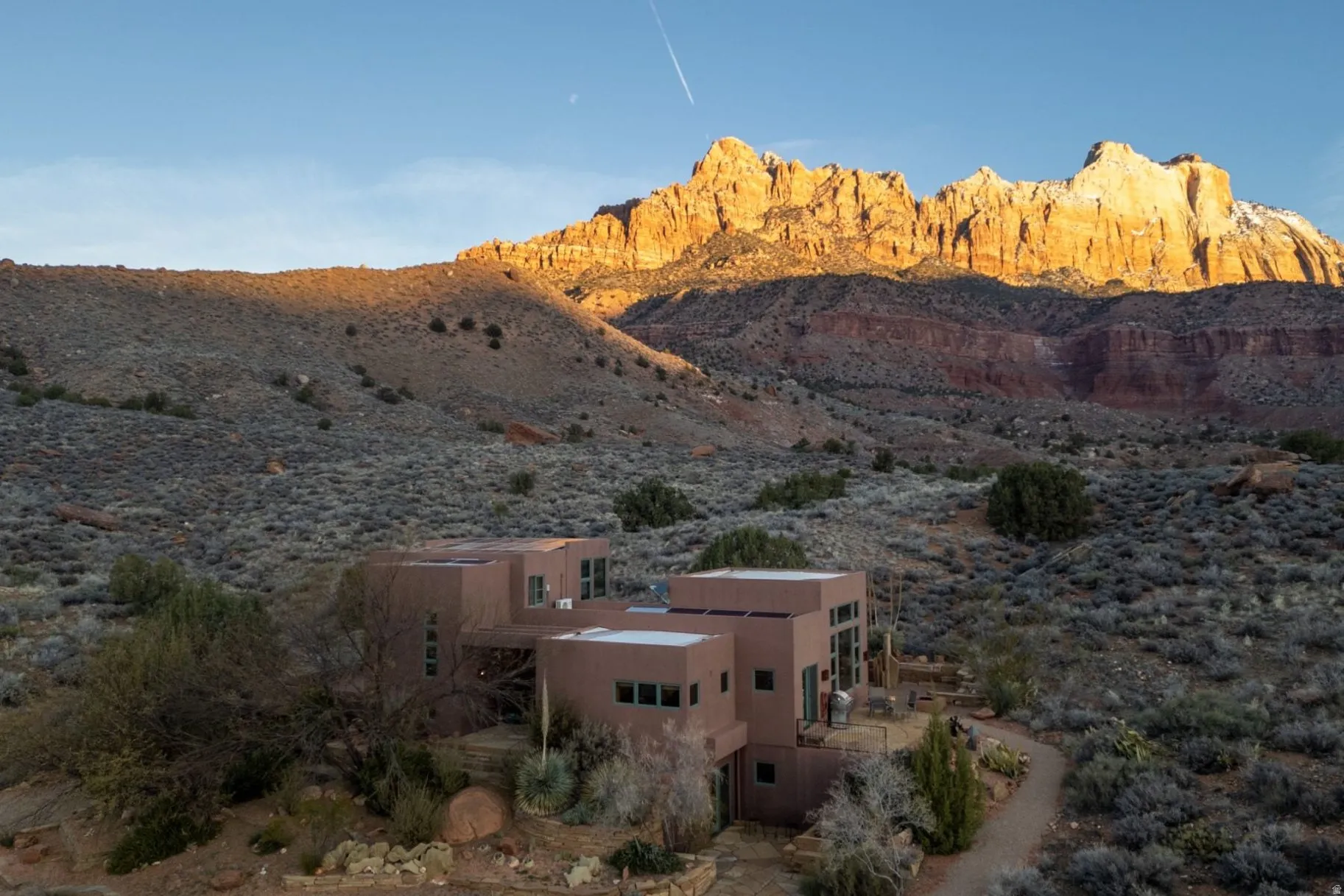 View of mountain backdrop featuring a desert landscape