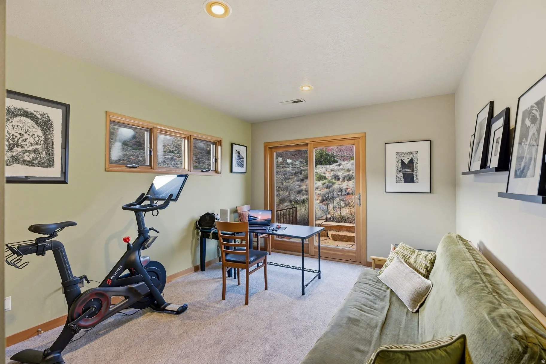 Office area featuring light colored carpet and recessed lighting
