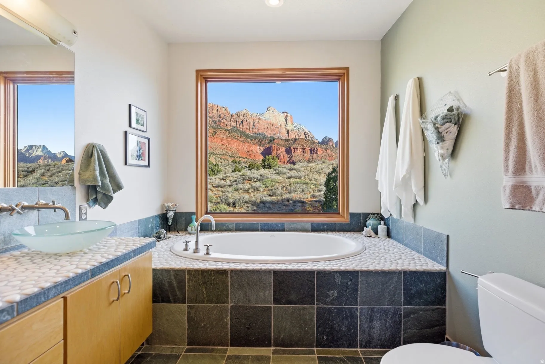 Bathroom featuring vanity and a garden tub