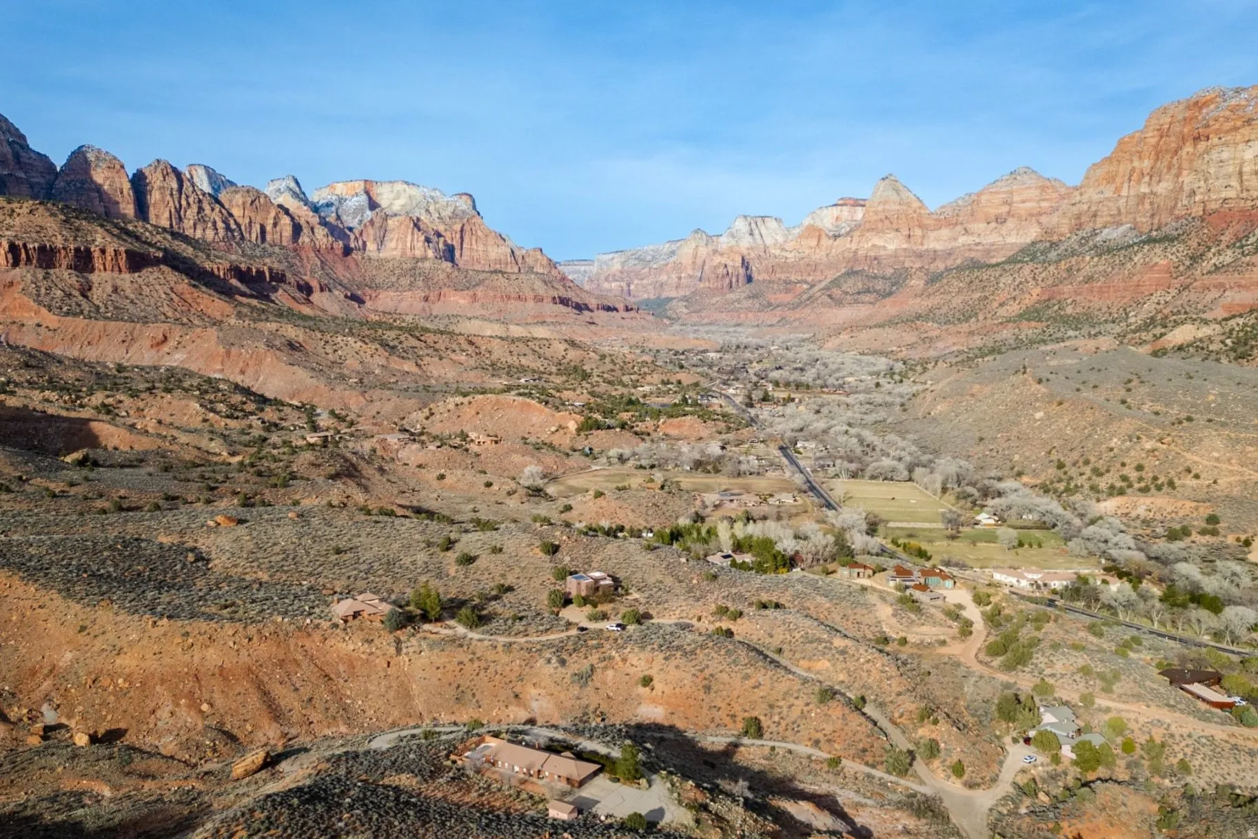 View of mountain backdrop featuring a desert landscape