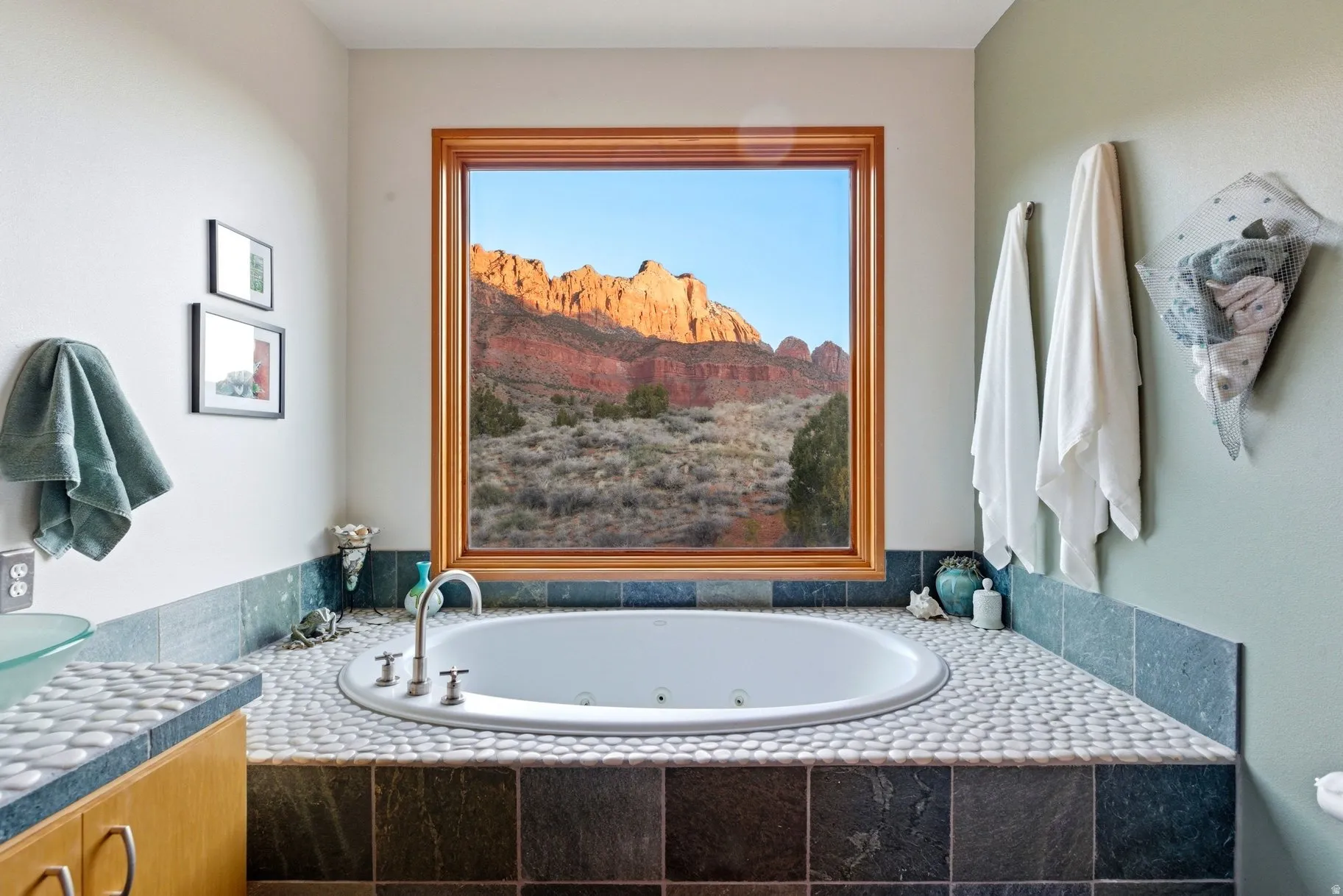 Bathroom with a jetted tub and vanity