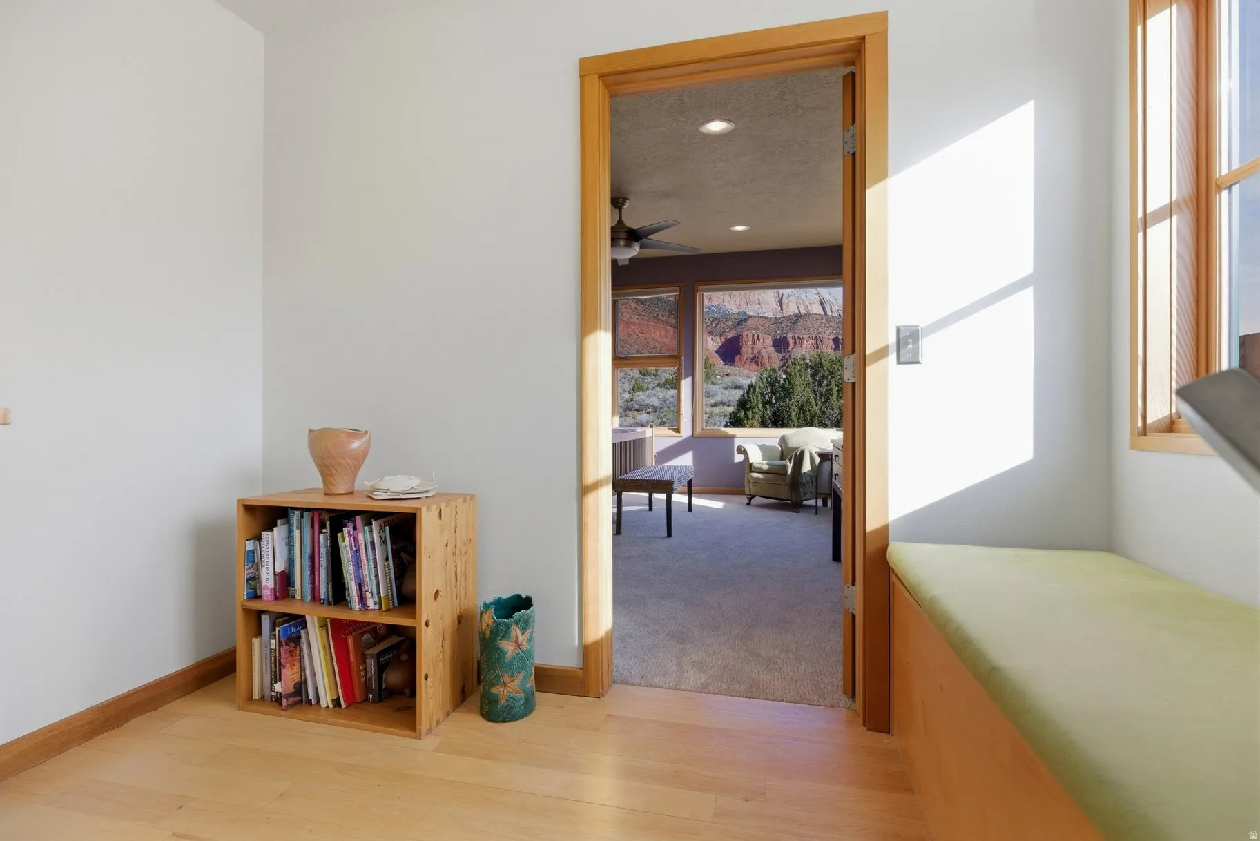 Hallway featuring recessed lighting and light wood-style flooring
