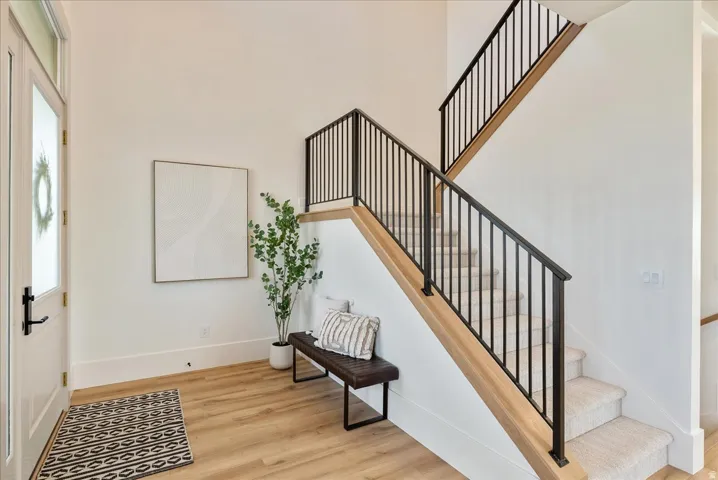 Entryway with light wood-style flooring
