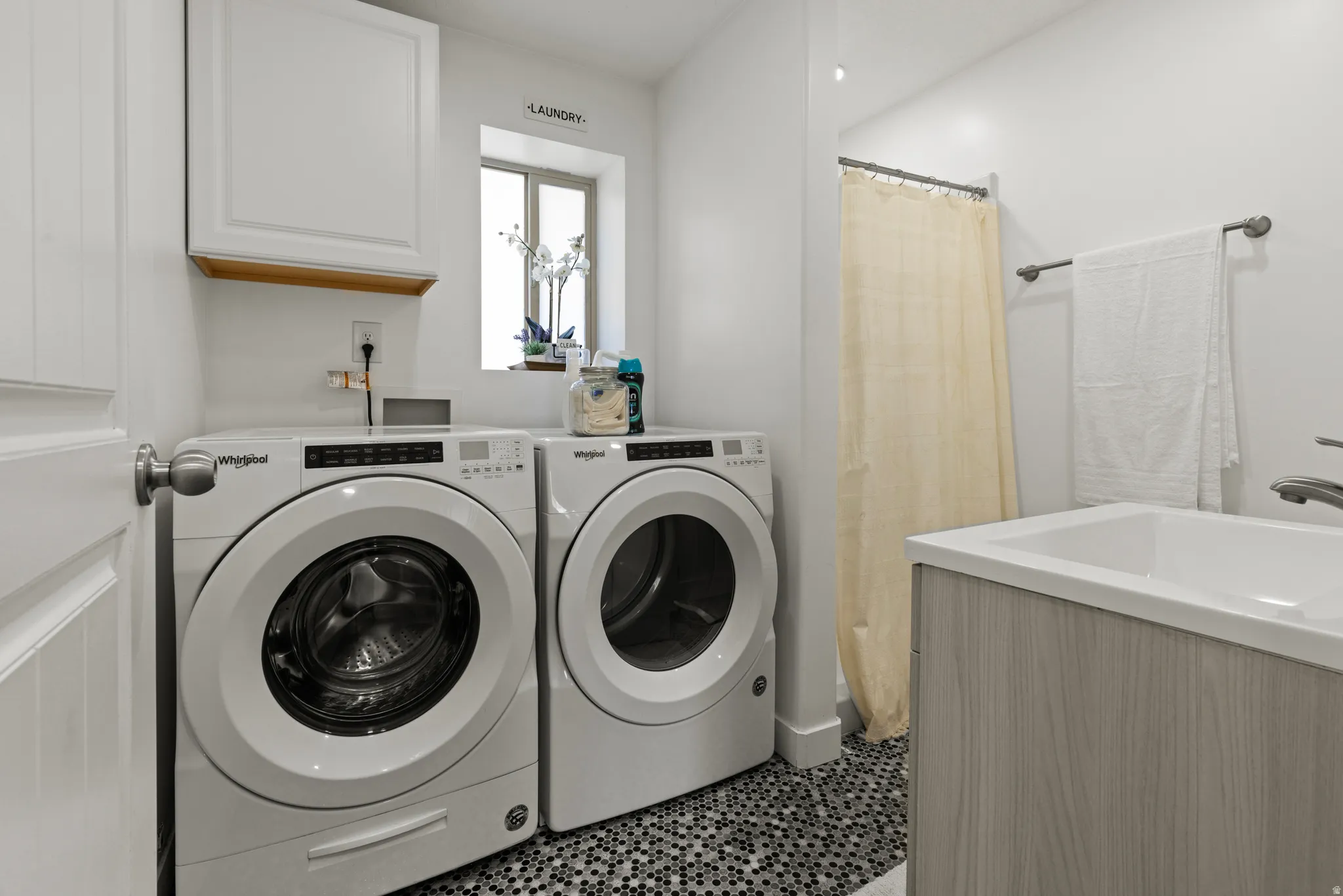 Laundry area featuring independent washer and dryer