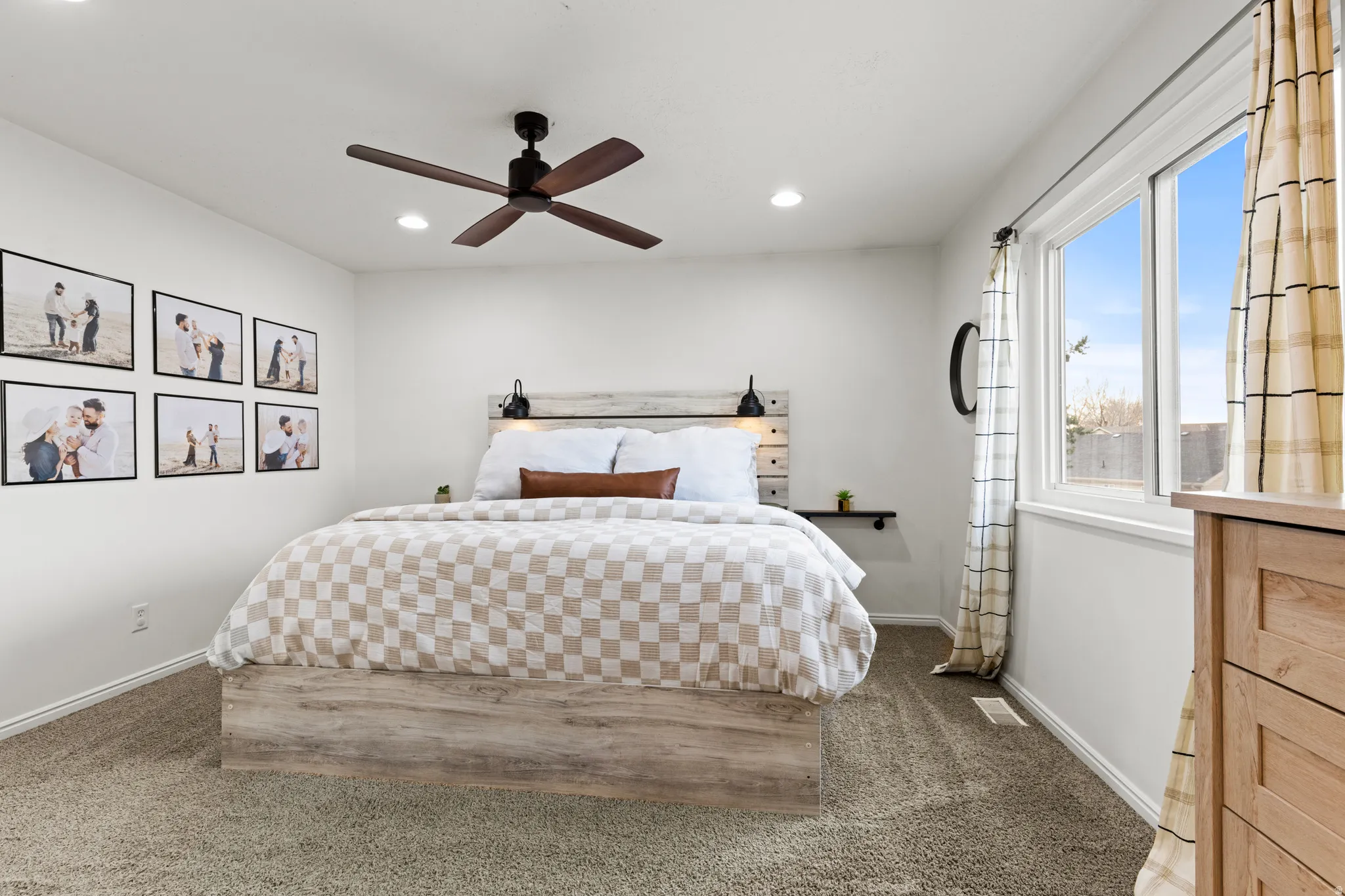 Bedroom featuring carpet floors, a ceiling fan, and recessed lighting