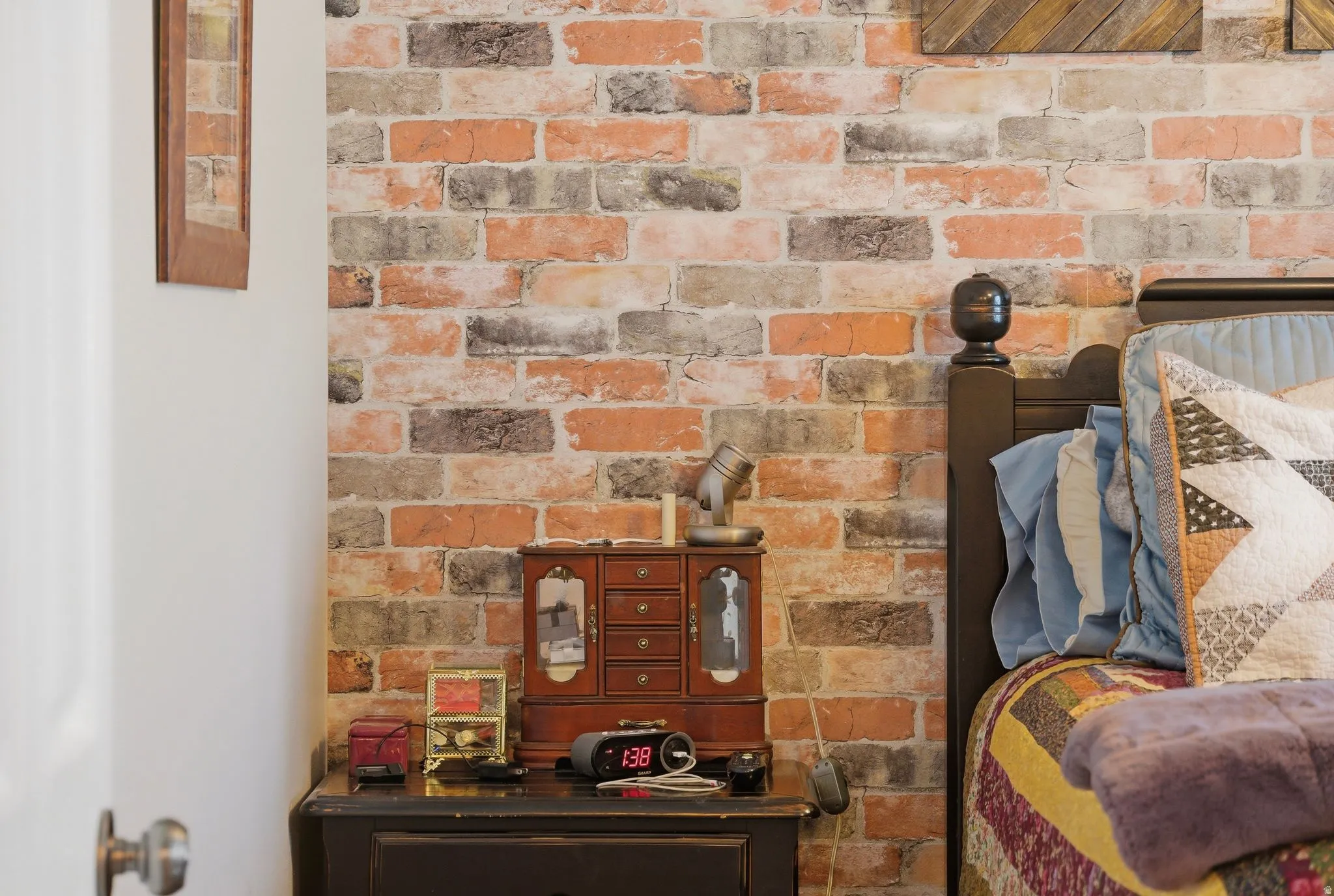 Bedroom view of brick wall